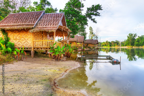 Small wooden houses at the jungle in Thailand © Patryk Kosmider