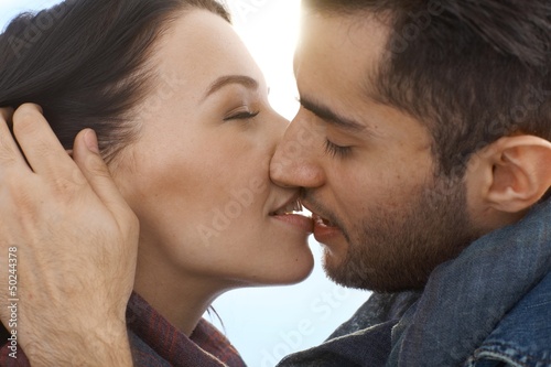 Loving couple kissing with passion