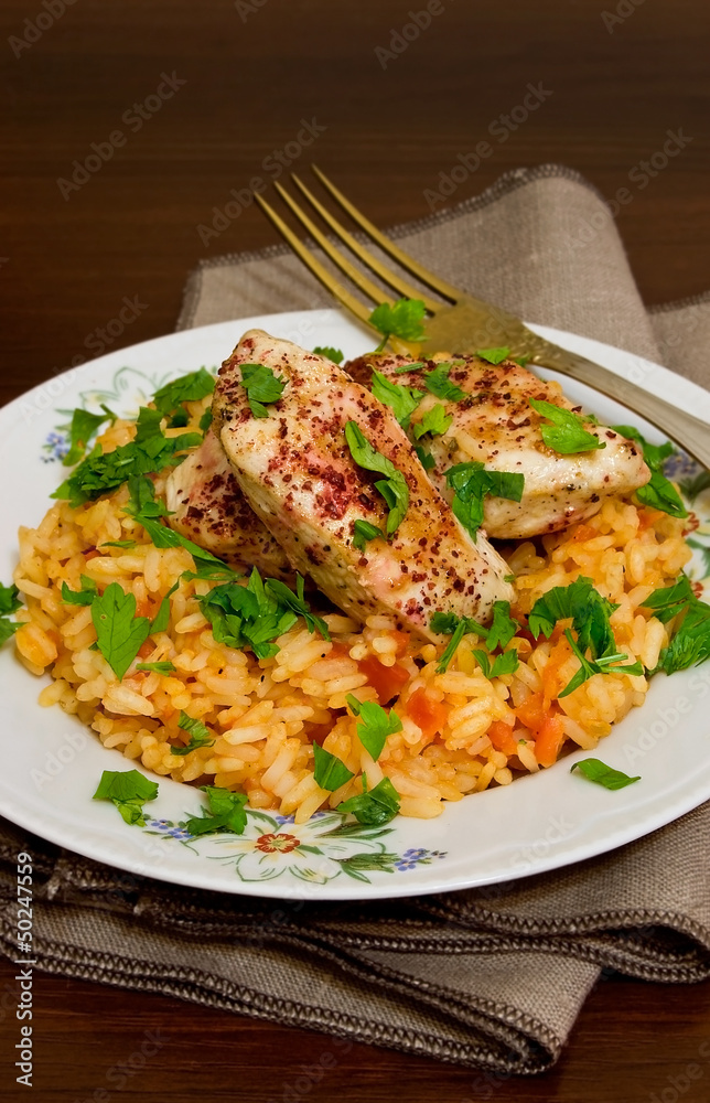 Tomato pilaf with chicken and sumac