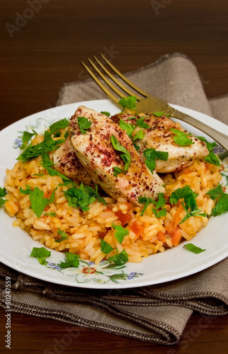Tomato pilaf with chicken and sumac