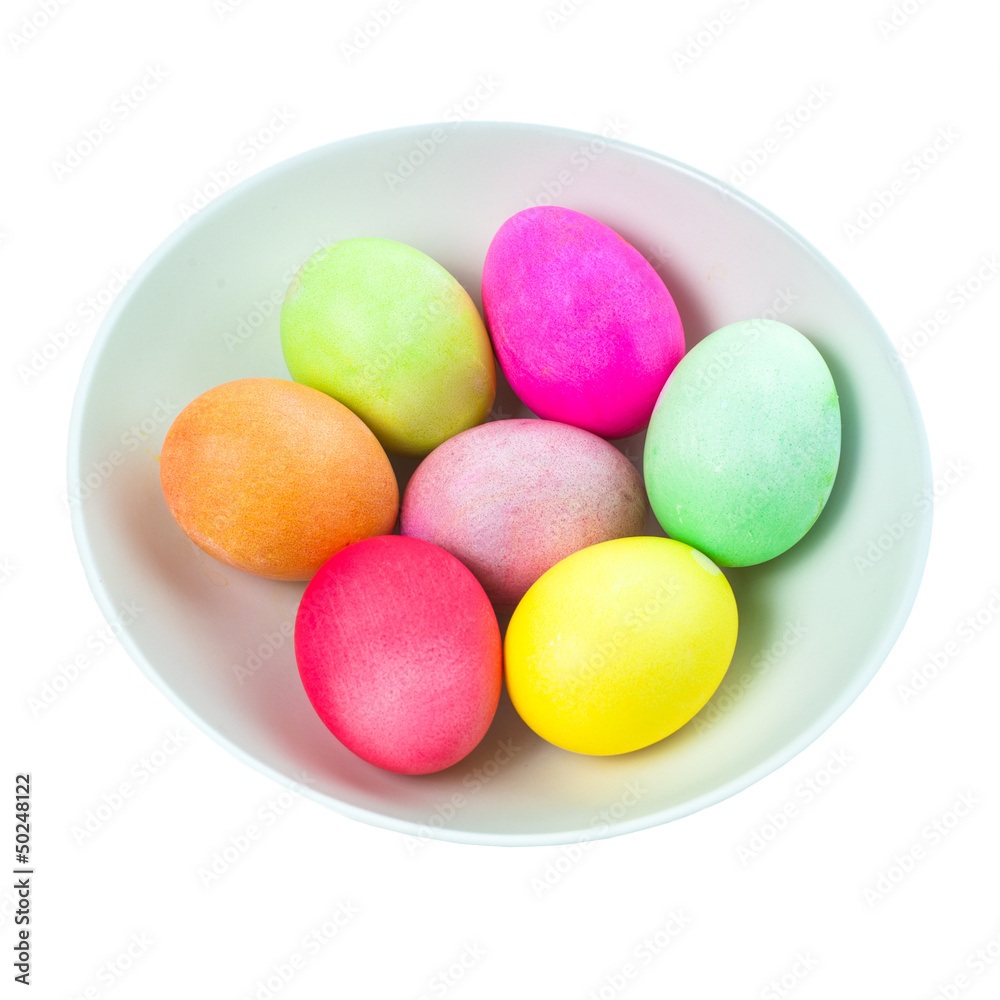 Easter eggs in a bowl on white background Easter eggs in a bowl on white background