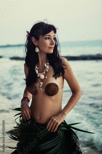 Принти на полотні Indigene woman in the palm skirt, seashells necklace and coconut