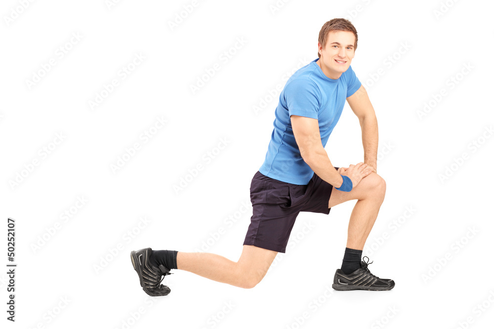 Young fit man exercising