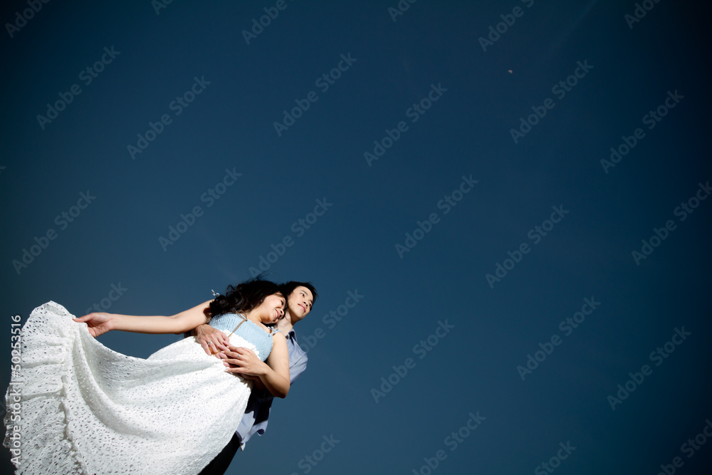 An in love young couple in romantic emotion under the moonlight An in love young couple in romantic emotion under the moonlight