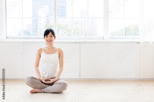 attractive asian woman exercising