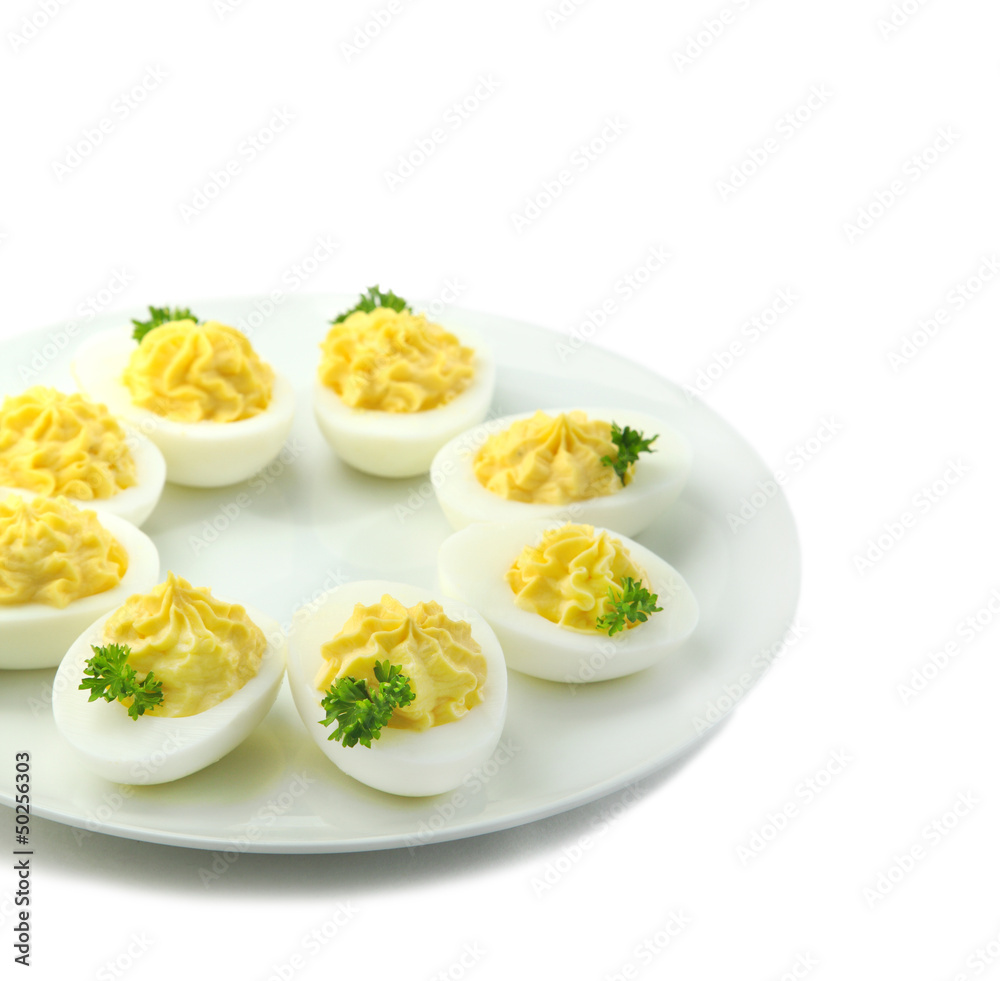 Deviled eggs with parsley in a plate Deviled eggs with parsley in a plate