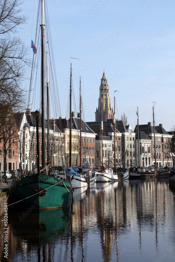 Ships and canalhouses in the city Groningen.The Netherlands