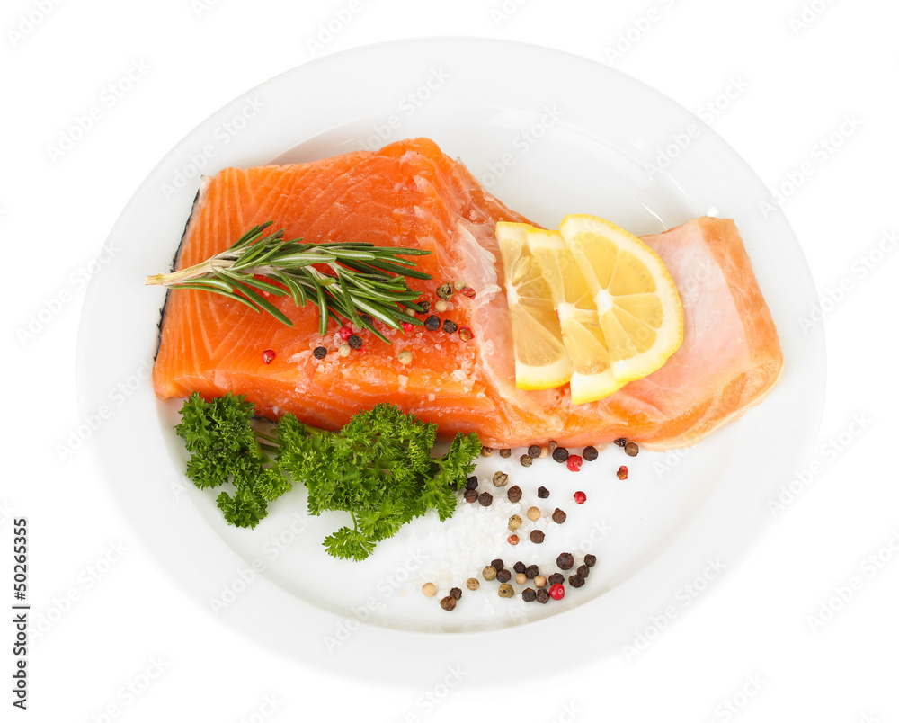 Fresh salmon fillet with herbals and lemon slices