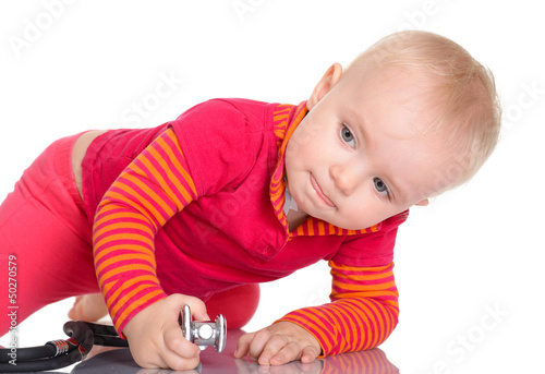 Cute baby girl with phonendoscope isolated on a white background