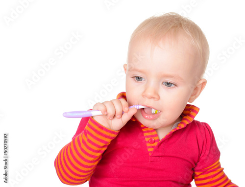 Little baby girl with toothbrush isolated on white background
