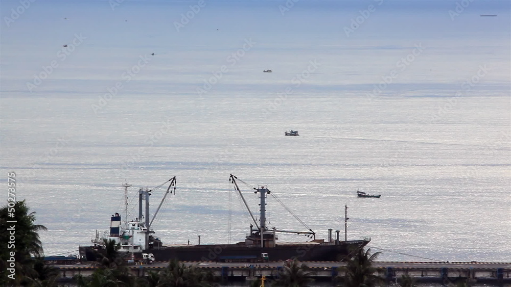 Ships floating in the High sea. Sihanoukville, Siam Gulf. Ships floating in the High sea. Sihanoukville, Siam Gulf.