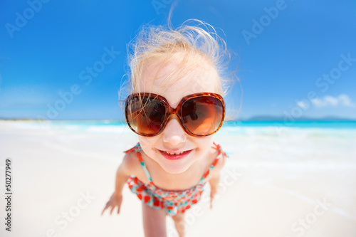 Little girl on beach vacation