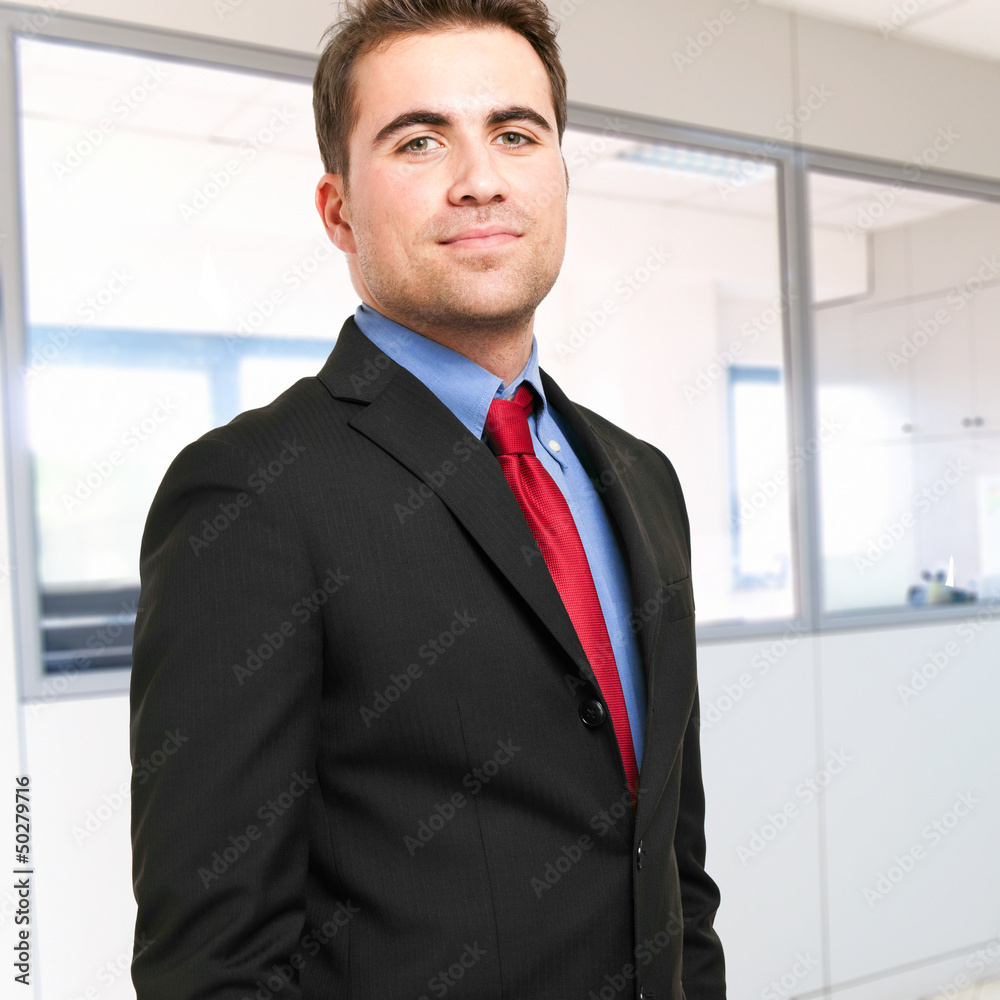 Fototapeta premium Confident businessman in his office