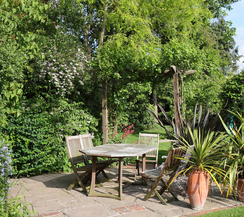 Canvas Print Patio area of an  English back Garden