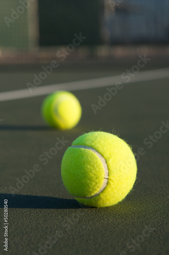 Tennis Balls on the Court © 33ft