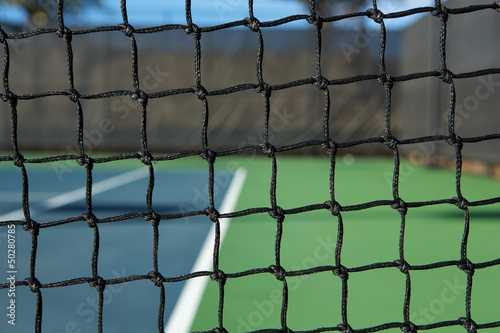 Tennis Court Net with the Court Beyond