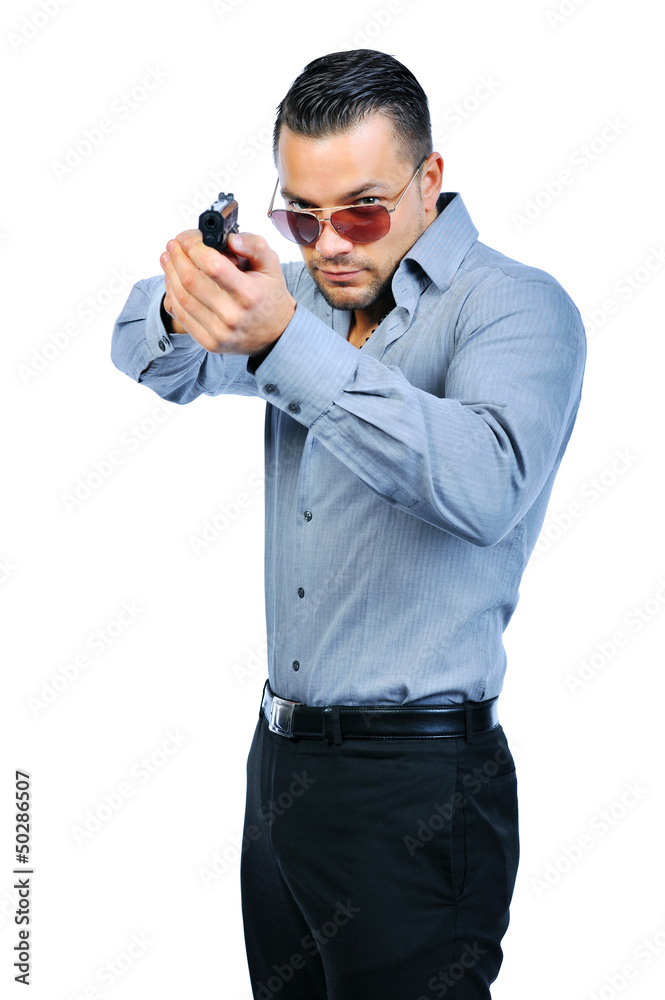 Handsome man with gun elegant spy Handsome man with gun elegant spy