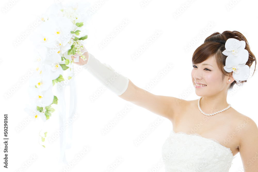 Beautiful asian woman dressed as a bride on white background
