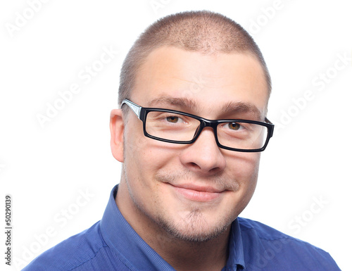 Fototapeta Naklejka Na Ścianę i Meble -  Young  attractive man  smiling in black eyeglasses.