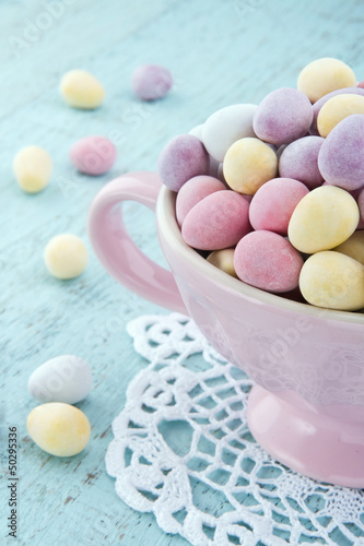 Small easter eggs on a wooden table