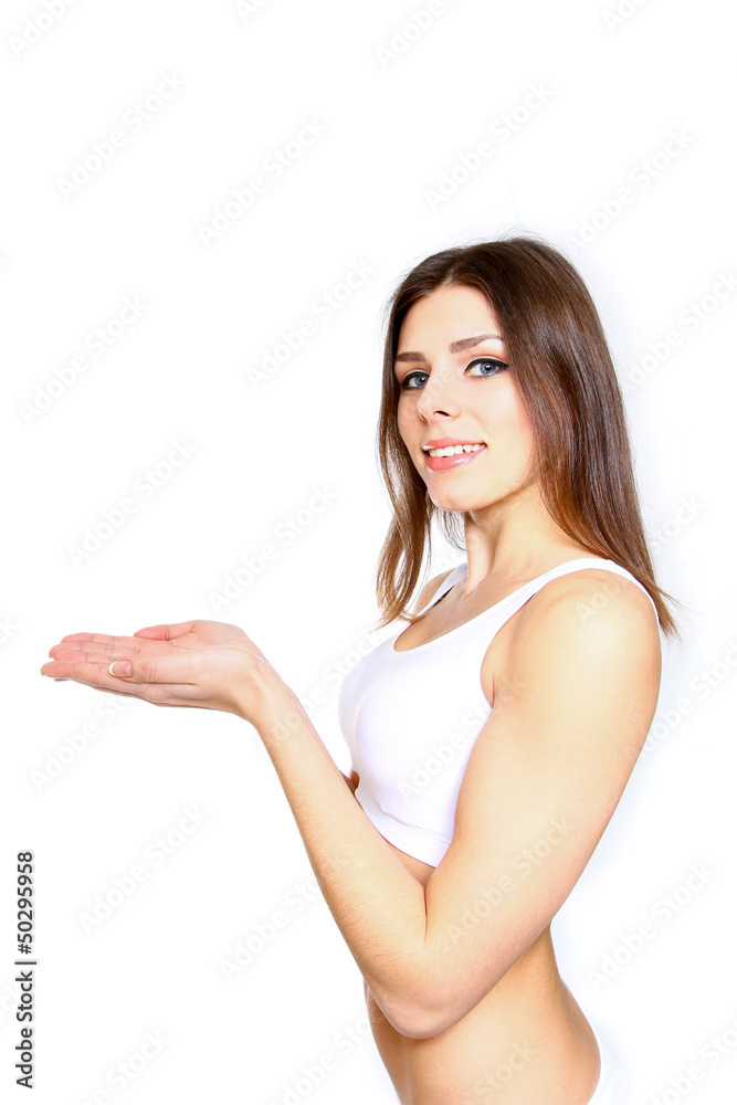 Smiling young woman show something with smile isolated on white Smiling young woman show something with smile isolated on white
