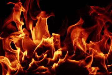 Acrylglasbilder Themen Lodernde Feuerflammen auf schwarzem Hintergrund  © Nneirda