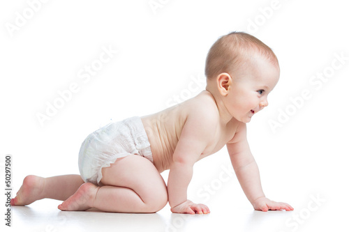 Photographie side view of pretty crawling baby