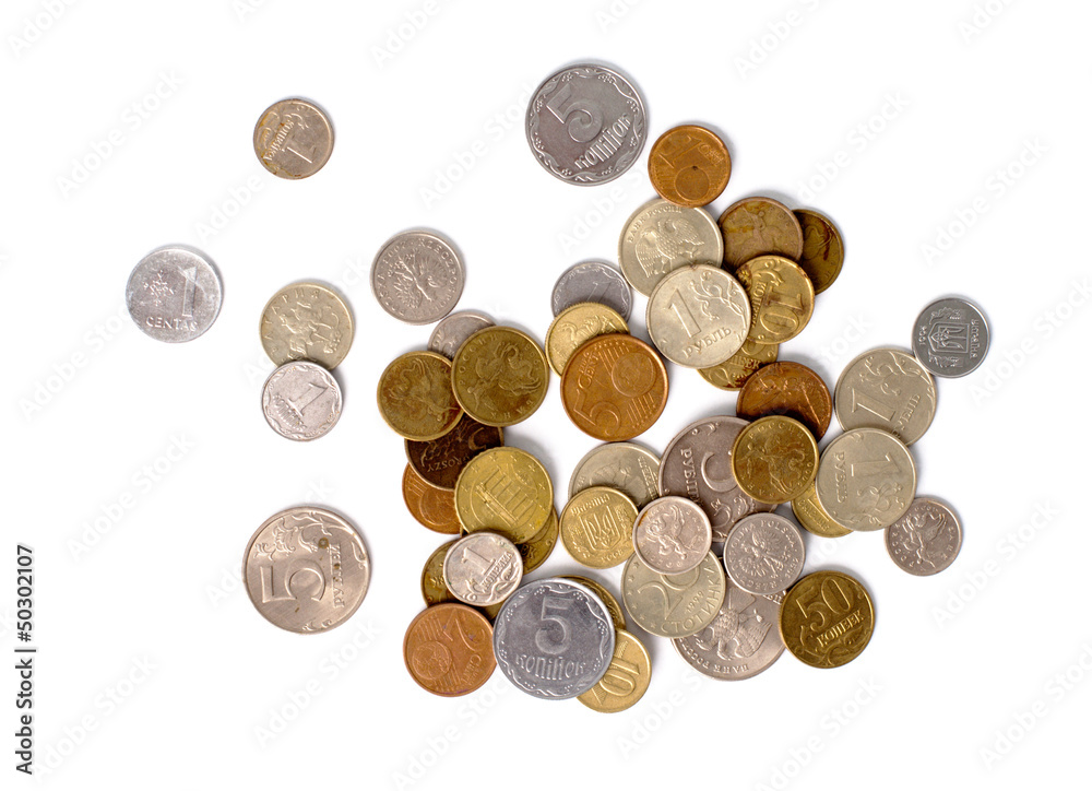 pile of coins scattered on white background pile of coins scattered on white background