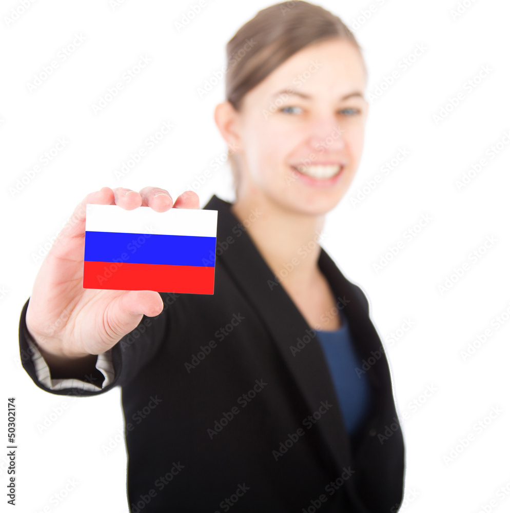 business woman holding a card with the Russian flag business woman holding a card with the Russian flag
