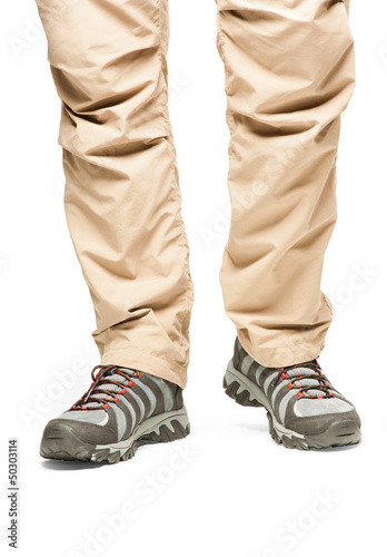 Hiker s legs in move at white background