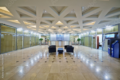 Empty entrance hall interior in office building photo