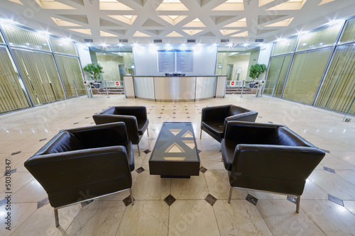 Empty hall with armchairs at business center Academicheskiy photo