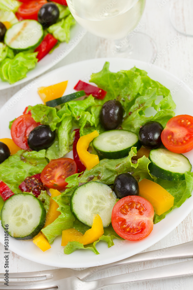 salad with fresh vegetables on the plate salad with fresh vegetables on the plate