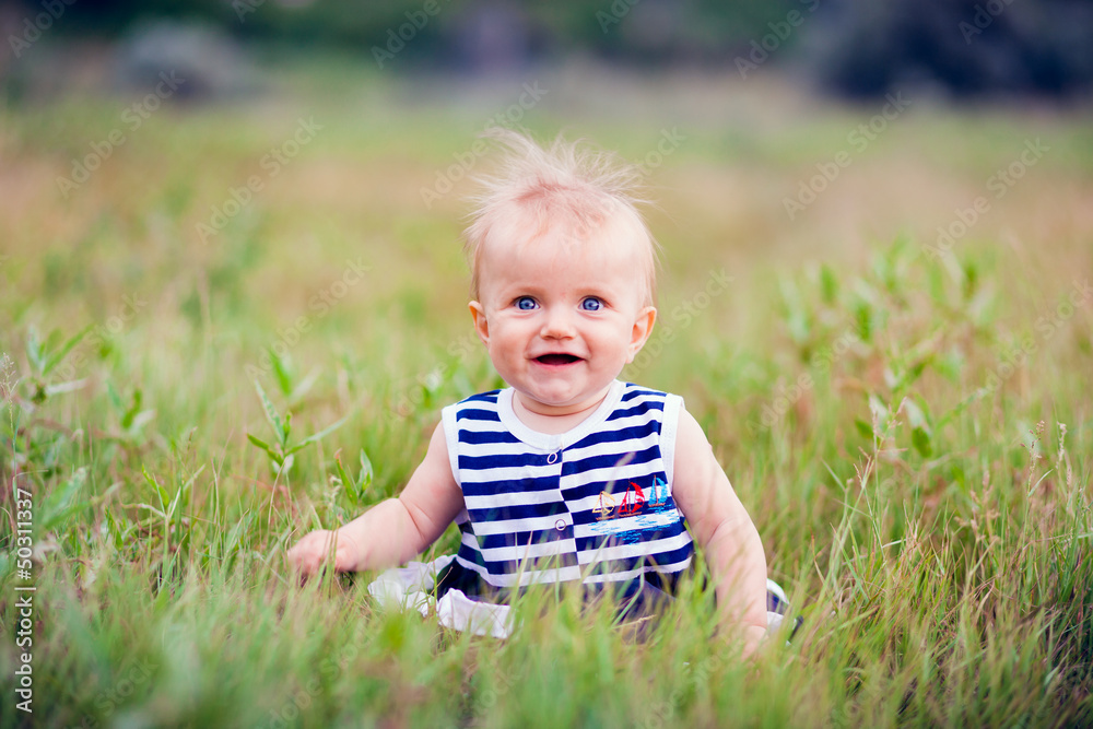 Portrait of a happy little girl in the park Portrait of a happy little girl in the park