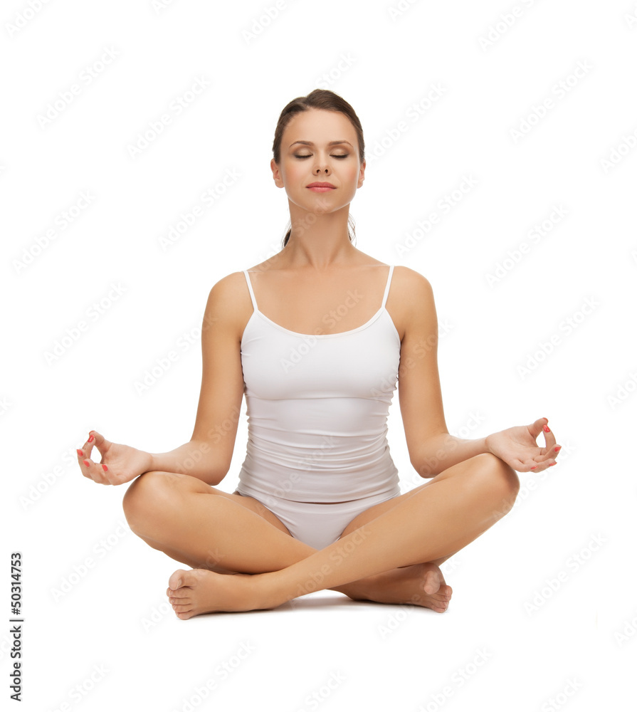 woman in cotton underwear doing exercises woman in cotton underwear doing exercises