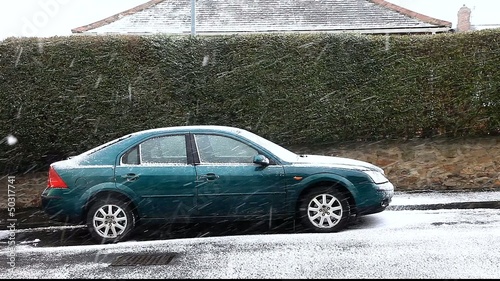 car in winter blizard uk