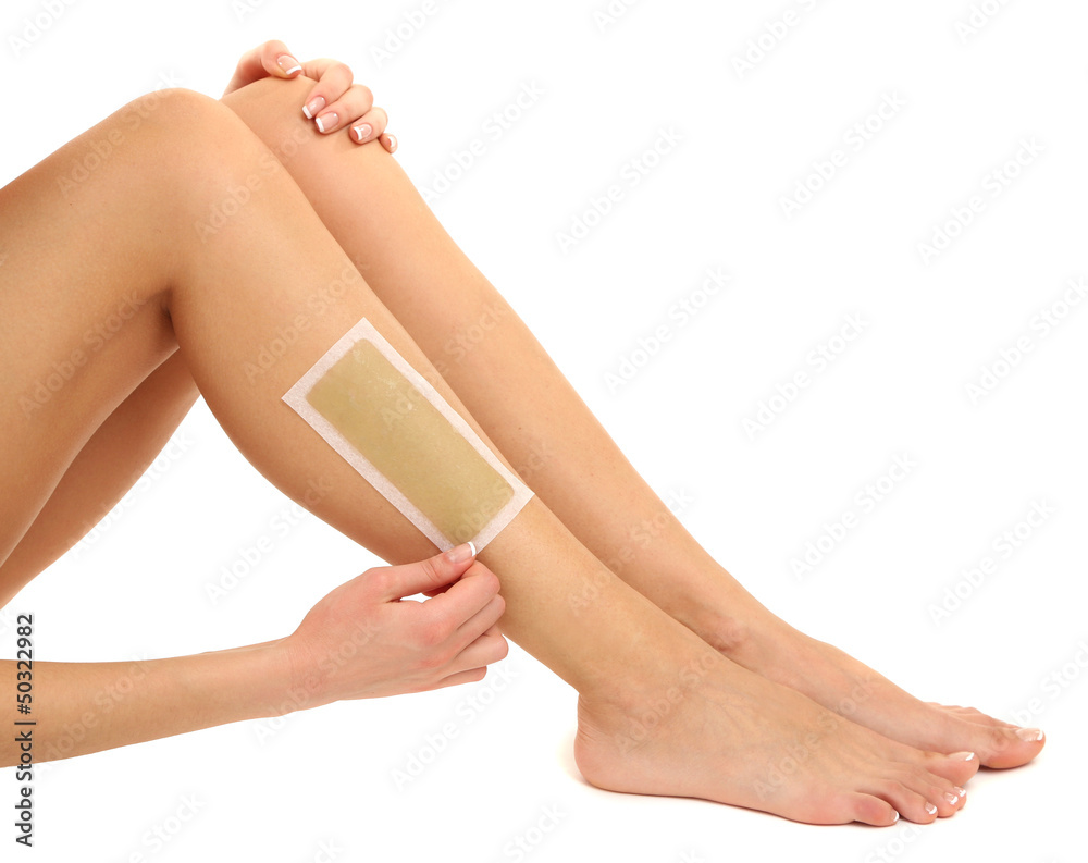 Beautiful woman doing depilation for her legs with waxing, Beautiful woman doing depilation for her legs with waxing,