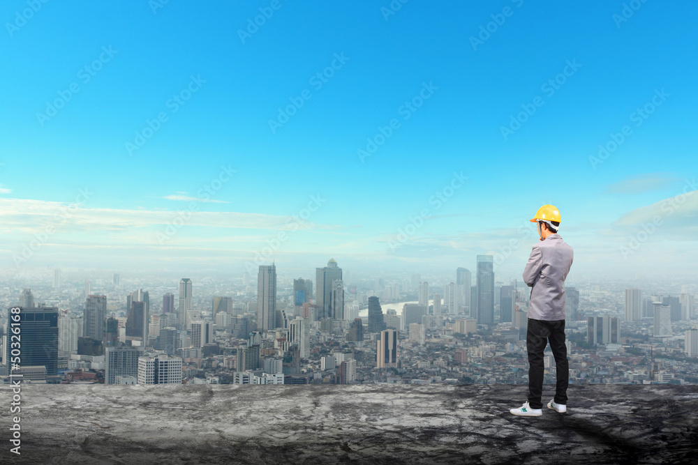 Building With engineer standing idea concept Building With engineer standing idea concept