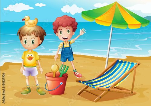 Kids at the beach with an umbrella and a foldable bed