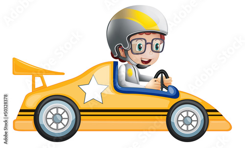 A girl in her yellow racing car