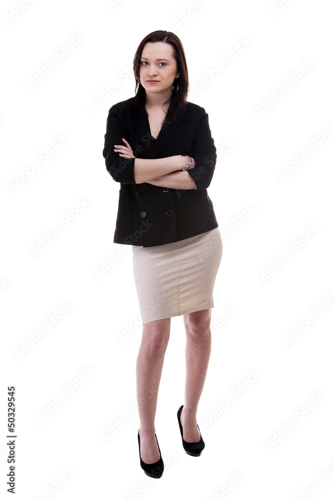 Businesswoman with hands crossed full body isolated over white b Businesswoman with hands crossed full body isolated over white b