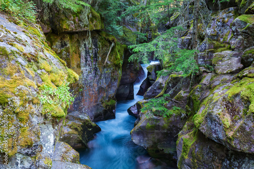 Waterfall in forest photo