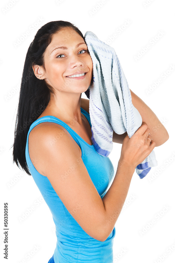woman cleaning her sweat with a towel. isolated on white woman cleaning her sweat with a towel. isolated on white