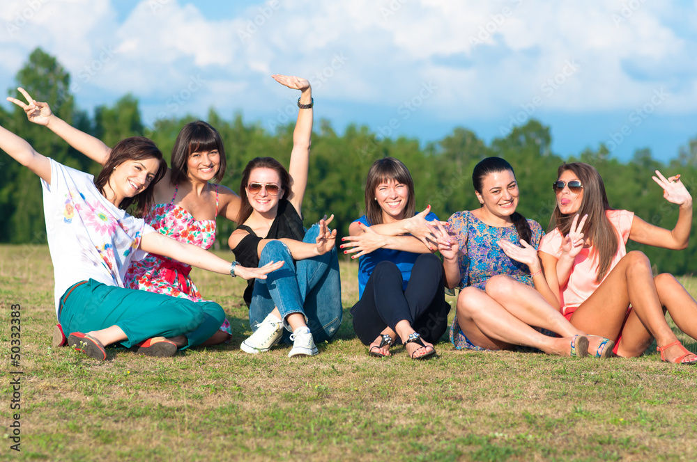 Obraz premium young girls with hands up