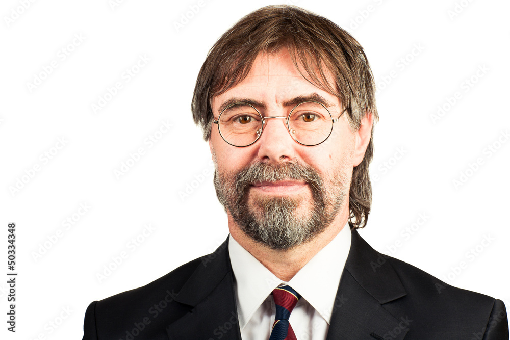 Portrait of a senior businessman smiling Portrait of a senior businessman smiling