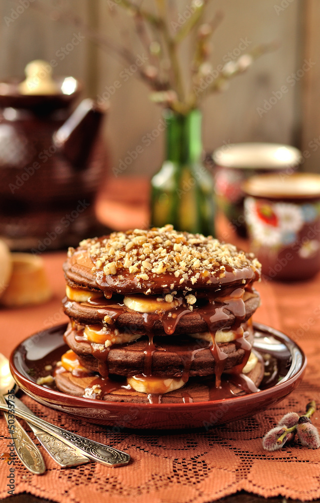 Chocolate Pancakes with Bananas and Caramel Sauce