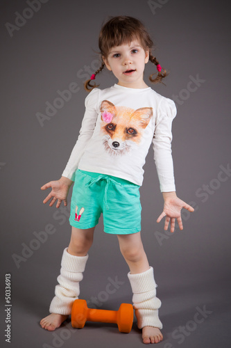 little girl on gray background