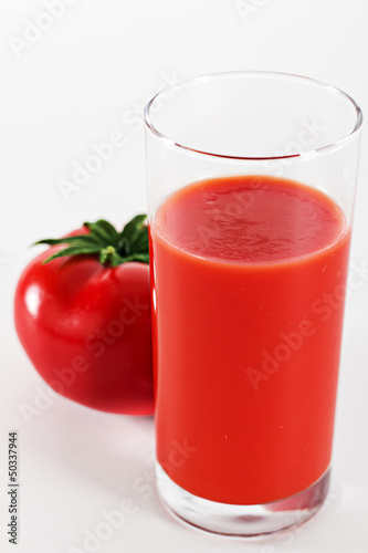 The glass of tomato juice