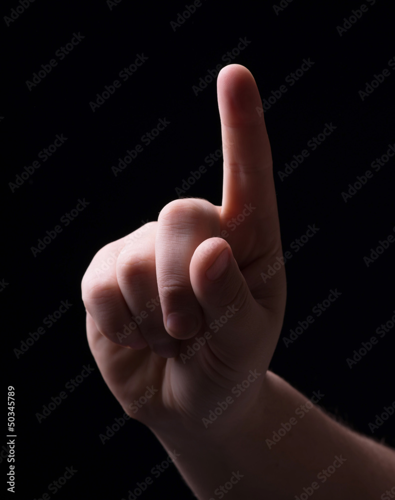 One finger on a black background