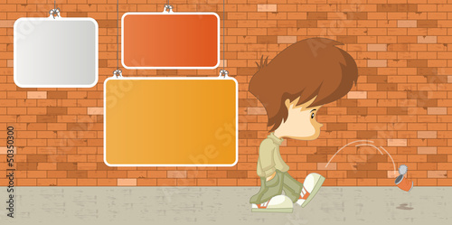 Sad boy kicking a can